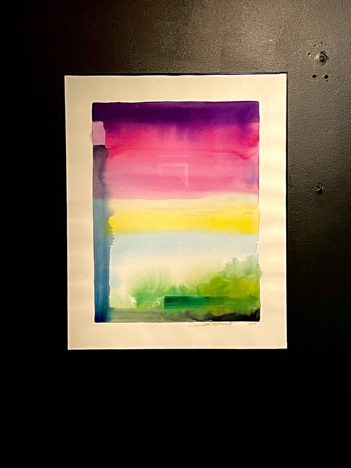 16 x 20 paper with 2 inch border, inside painting with purple, pink, blue, yellow and green watercolor